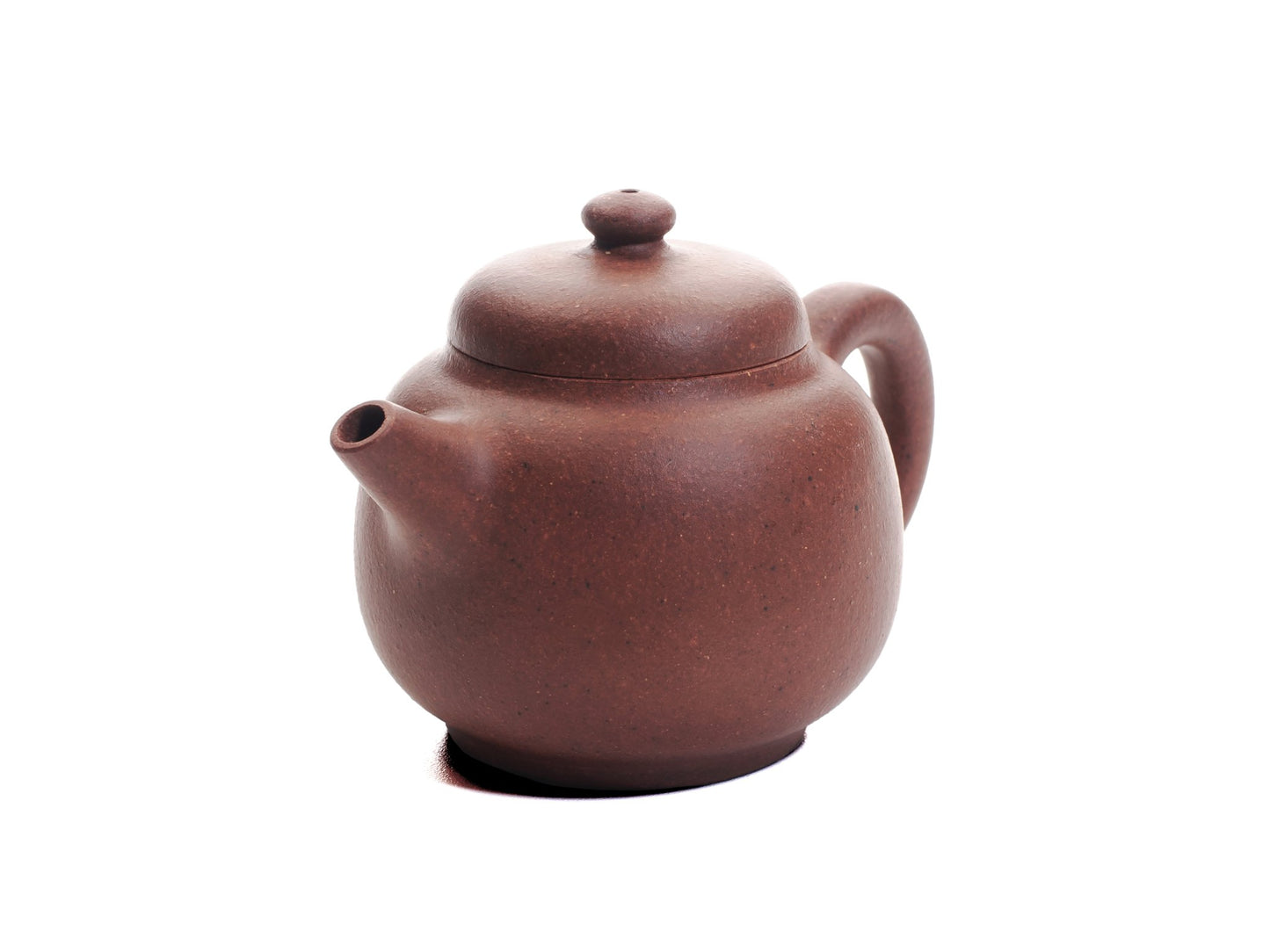 Angled front view of the Xiao Da Bin handmade Yixing teapot crafted from diamond‑grade purple clay.