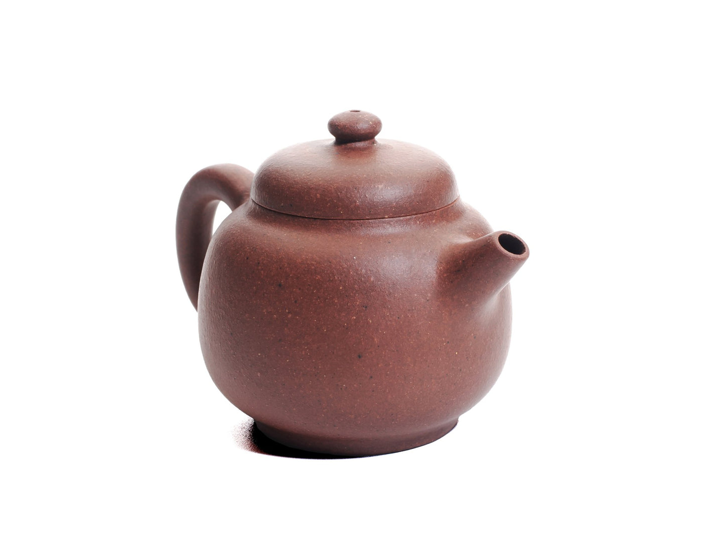 Front‑right view of the Xiao Da Bin teapot highlighting the short spout and balanced silhouette of the 50 ml diamond‑grade purple clay.