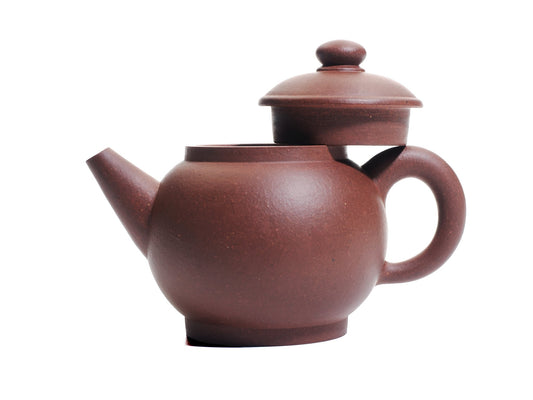 Ju Lun Zhu teapot with lid removed and resting on the handle, revealing the 120 ml mouth and round profile.