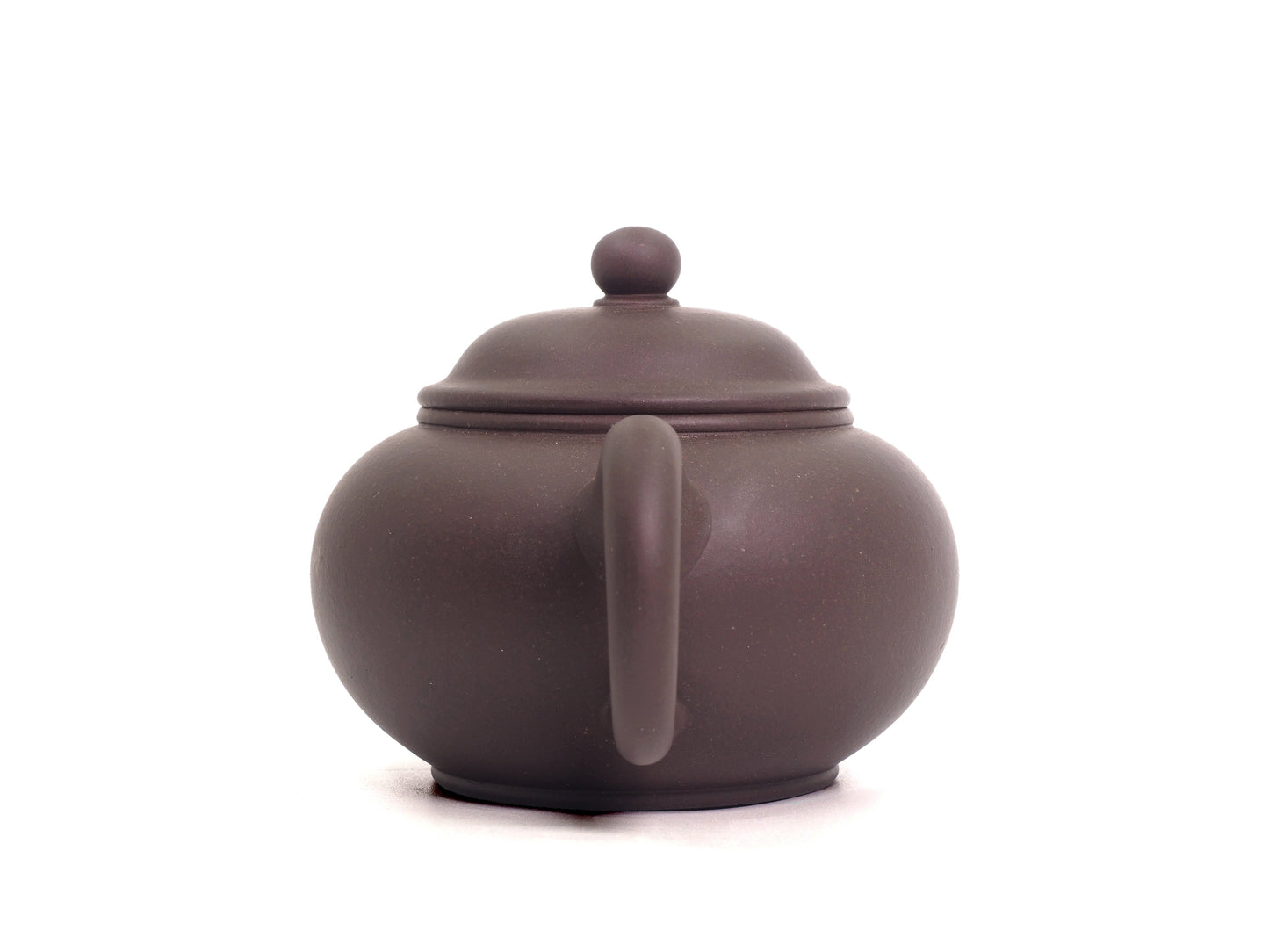 Back view showing round handle of Shui Ping Zisha Teapot
